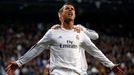 Real Madrid's Ronaldo and Ramos celebrate a goal against Barcelona during La Liga's second 'Clasico' soccer match of the season in Madrid