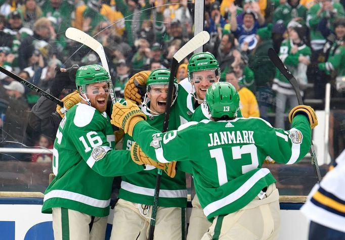 Jan 1, 2020; Dallas, TX, USA; Dallas Stars defenseman Andrej Sekera (5) celebrates with teammates after scoring a goal against the Nashville Predators during the third pe