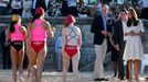 Britain's Prince William and his wife Catherine, the Duchess of Cambridge, meet junior surf lifesavers with New South Wales state Premier Baird at Sydney's Manly beach