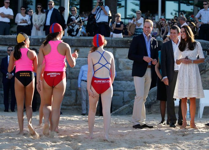 Britain's Prince William and his wife Catherine, the Duchess of Cambridge, meet junior surf lifesavers with New South Wales state Premier Baird at Sydney's Manly beach