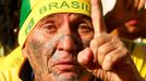 A Brazilian fan reacts as he watches his team play against Croatia during their 2014 World Cup opening match at a FIFA event in Manaus June 12 2014 REUTERS/Siphiwe Sibeko