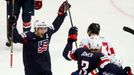 Craig Smith of the U.S. (L) celebrates the goal of team mate Tyler Johnson (R) against Switzerland during the third period of their men's ice hockey World Championship gr