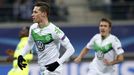 VfL Wolfsburg's Julian Draxler celebrates after scoring against KAA Gent.