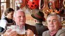 Hoeness, President of FC Bayern Munich and head coach Ancelotti pose during their visit at the Oktoberfest in Munich