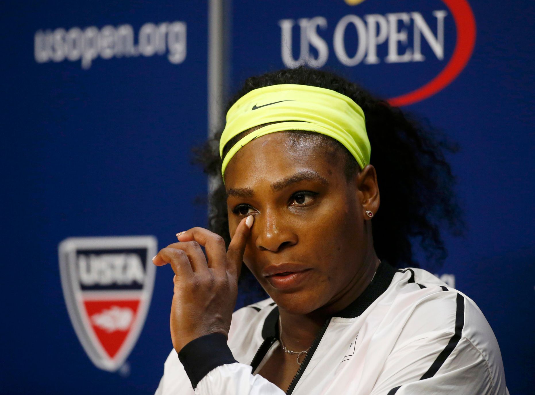 Williams of the U.S. listens to a reporter's question during a post-match press conference following her loss to Vinci of Italy in their women's singles semi-final match at the U.S. Open Championships