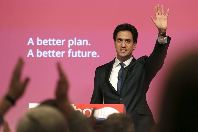 Britain's opposition Labour Party leader Ed Miliband waves at an election campaign event in Warrington, north west England