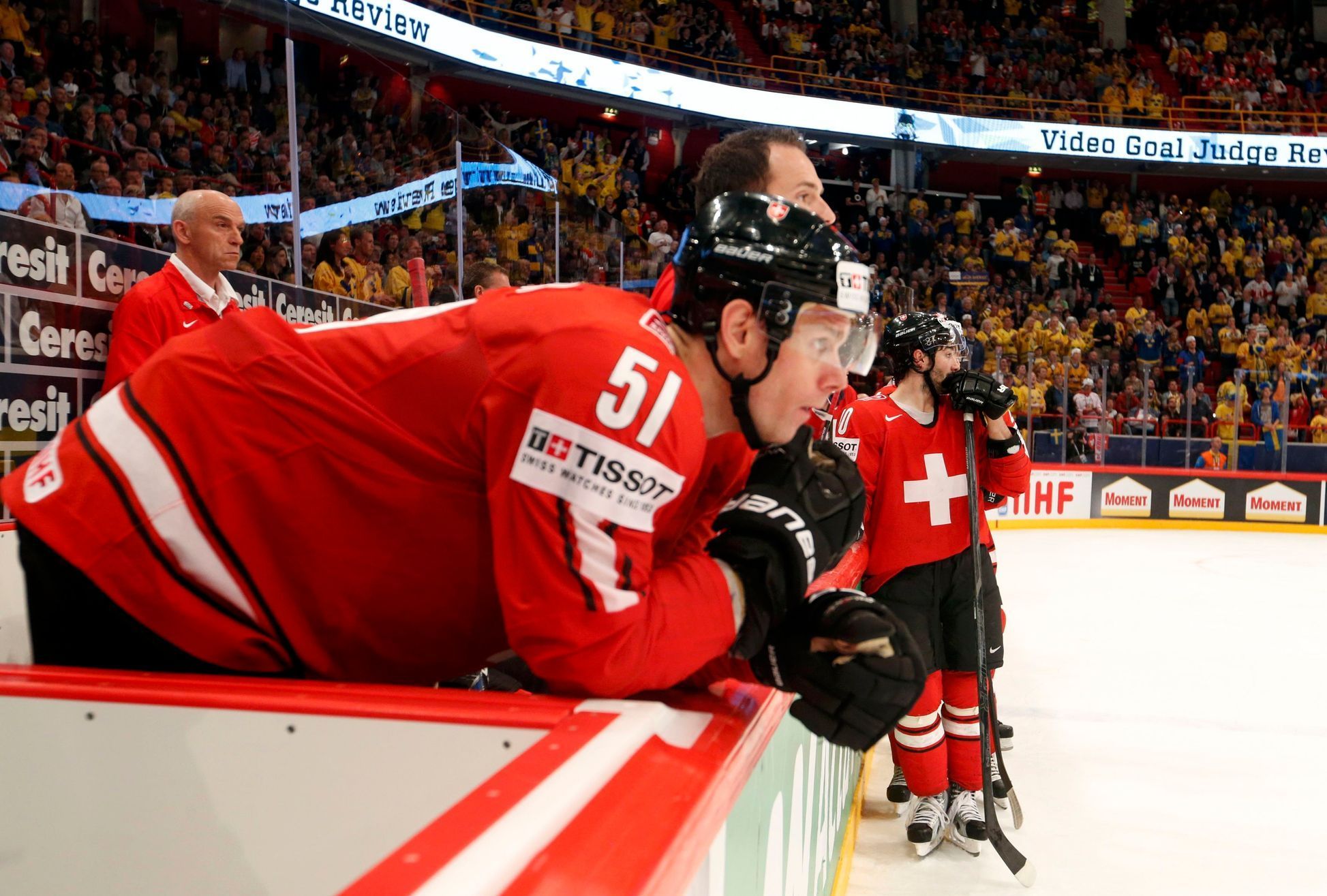 Switzerland's players react after their loss to Sweden in th