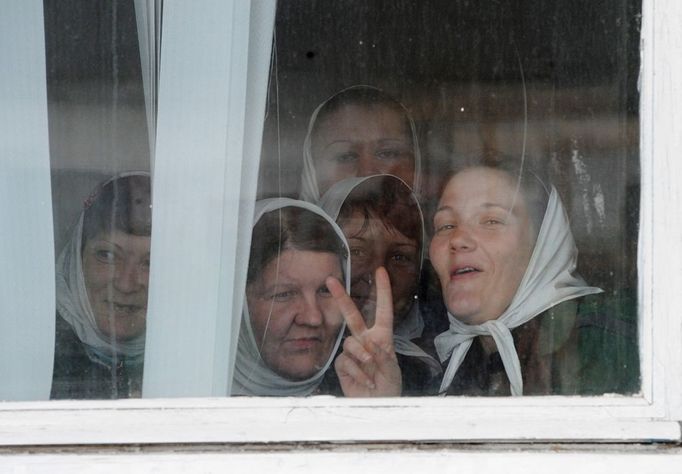 Female Penal Colony No. 3 of UFSIN for Ivanov region 1103505 Russia, Kineshma. 04/24/2012 Inmates at the Female Penal Colony No. 3 of the Administration of the Federal Penitentiary Service (UFSIN) of Russia for the Ivanov region look out a window.