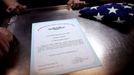 April 24, 2011 - Cape Canaveral, Florida, U.S. - -- Cape Canaveral, Fla. -- Culinary Specialist Seaman Tyler Keyes', , of Stillwater, Minnesota, certificate after receiving his Submarine qualification pins during a Dolphin presentation in the Crew's Mess aboard the USS Annapolis (SSN 760), a S6G nuclear reactor powered fast attack submarine, sailing from Cape Canaveral on Sunday. The pins were first authorized for use in 1941. To ''Qualify Submarines,'' a submariner must possess an in-depth knowledge of ship's construction, operation, and damage control and demonstrate his reliability under battle conditions. The USS Annapolis measures 362 ft. in length and 33 ft. at the beam, a diving depth of over 400 ft., 27+ mph, 12 vertical launch missile tubes, 4 torpedo tubes, and a crew of 130 enlisted submariners. The submarine was commissioned April 11, 1992