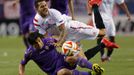 Sevilla's Victor Machin &quot;Vitolo&quot; falls beside Fiorentina's Matias Fernandez during their Europa League semi-final, first leg soccer match at Ramon Sanchez Pizju