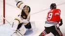 Boston Bruins goalie Tuukka Rask makes a save on Chicago Blackhawks' Jonathan Toews during the first period in Game 2 of their NHL Stanley Cup Finals hockey series in Chi