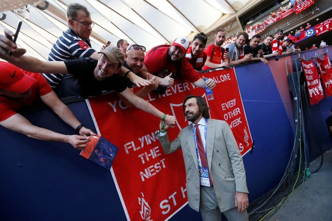 Soccer Football - Champions League Final - Tottenham Hotspur v Liverpool - Wanda Metropolitano, Madrid, Spain - June 1, 2019  Andrea Pirlo poses for a selfie with a fan i