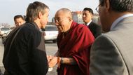 Upon his arrival to Prague's Congress Center, the Dalai Lama was greeted by Prague Mayor Pavel Bém who wore a badge bearing a Tibetan flag on his shirt. The public talk in the Congress Center was held under the auspices of Prague Mayor.