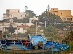 Vraky imigrantských lodí na Lampeduse.