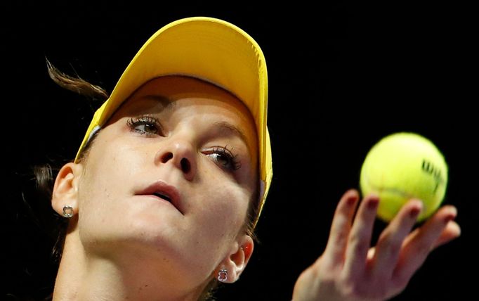 Agnieszka Radwanska of Poland prepares to serve to Petra Kvitova of the Czech Republic during their WTA Finals singles tennis match at the Singapore Indoor Stadium Octobe