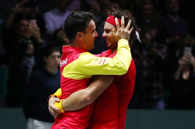 Tennis - Davis Cup Finals - Final - Caja Magica, Madrid, Spain - November 24, 2019   Spain's Rafael Nadal celebrates with Roberto Bautista Agut after winning his match ag