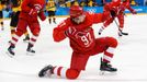 Nikita Gusev slaví gól ve finále olympiády 2018.