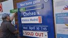 A Chelsea stadium worker changes the wooden fixture board to their next match following tonights Champion's League semi-final second leg soccer match against Atletico Mad