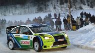 Finský pilot Marcus Grönholm s vozem Ford Focus RS WRC 06 na trati první etapy Švédské rallye.