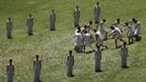 Actors take part in a dress rehearsal for the torch lighting ceremony of the London 2012 Olympic Games at the site of ancient Olympia in Greece May 9, 2012. The official lighting ceremony for the London Games will take place on May 10. REUTERS/Kevin Coombs (GREECE - Tags: SPORT OLYMPICS TPX IMAGES OF THE DAY) Published: Kvě. 9, 2012, 10:28 dop.