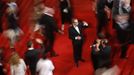 RNPS IMAGES OF THE YEAR 2012 - Guests take photographs on the red carpet during arrivals for the screening of the film "Baad El Mawkeaa", in competition at the 65th Cannes Film Festival, May 17, 2012. REUTERS/Vincent Kessler (FRANCE - Tags: ENTERTAINMENT TPX IMAGES OF THE DAY) Published: Pro. 4, 2012, 1:21 dop.