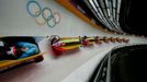 Belgium's pilot Elfje Willemsen and Hanna Emilie Marien speed down the track during the women's bobsleigh event at the 2014 Sochi Winter Olympics, at the Sanki Sliding Ce