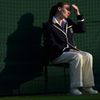 A line judge sits on court one at the Wimbledon Tennis Champ