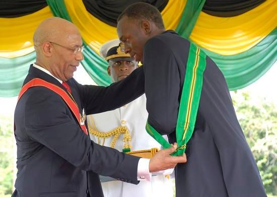 Usain Bolt při předávání