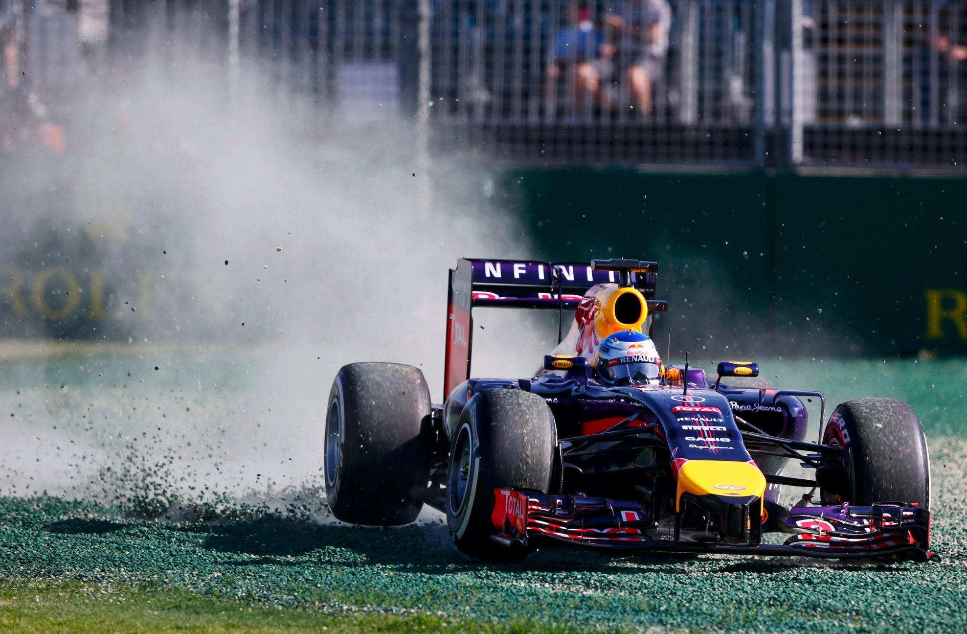 Red Bull Formula One driver Vettel of Germany drives into the gravel during the second practice session of the Australian F1 Grand Prix in Melbourne