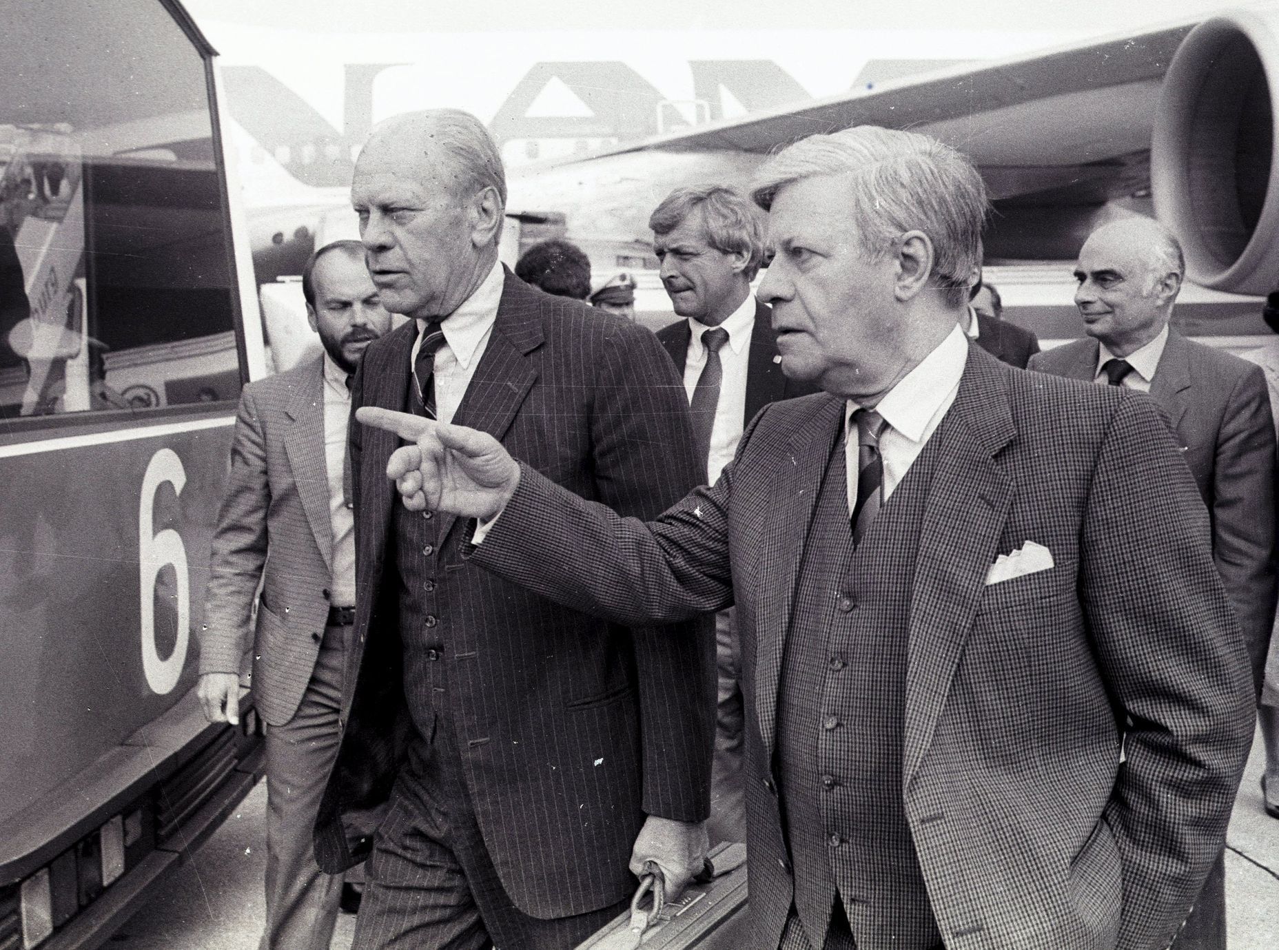 File photo shows Former U.S. President Gerald Ford arriving on a private visit for talks with former West German Chancellor Schmidt, who welcomed him at Hamburg airport