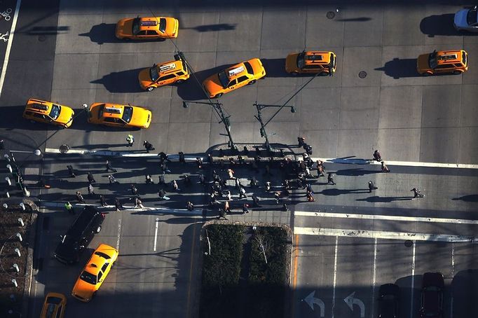 Pedestrians cross the street in lower Manhattan