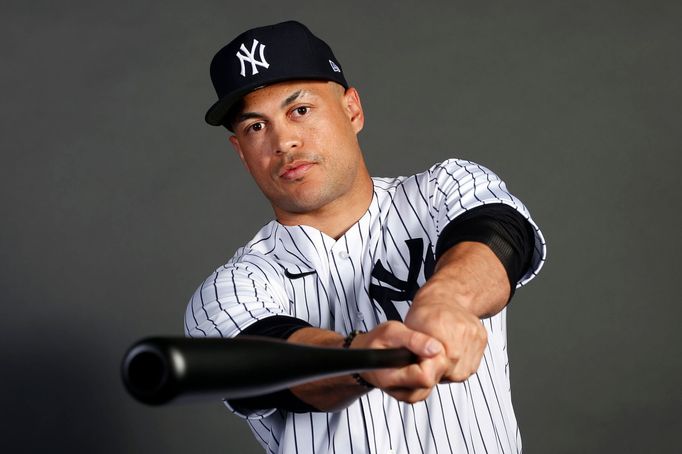 Feb 20, 2020; Tampa, Florida, USA; New York Yankees designated hitter Giancarlo Stanton (27) poses for a photo during media day Mandatory Credit: Butch Dill-USA TODAY Spo