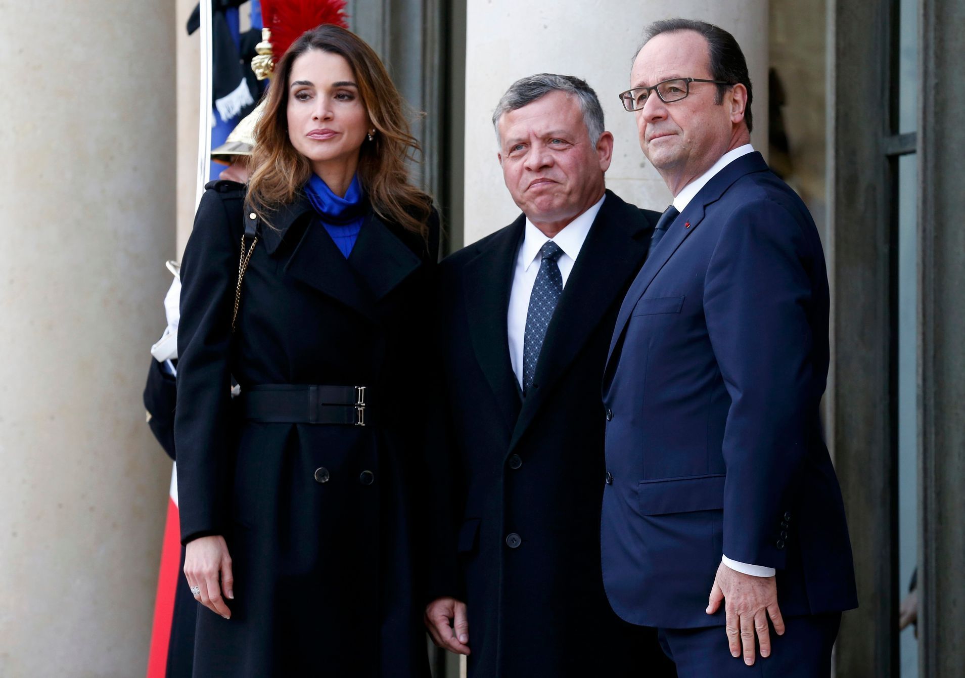 French President Francois Hollande welcomes Jordan's King Abdullah and his wife Queen Rania at the Elysee Palace before attending a solidarity march in the streets of Paris