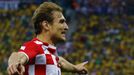 Croatia's Nikica Jelavic celebrates an own goal by Brazil's Marcelo during their 2014 World Cup opening match at the Corinthians arena in Sao Paulo June 12, 2014. REUTERS