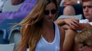 Ester Satorova, the girlfriend of Tomas Berdych of Czech Republic, returns to her seat during her men's singles match at the Australian Open 2014 tennis tournament in Mel