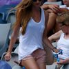 Ester Satorova, the girlfriend of Tomas Berdych of Czech Republic, returns to her seat during her men's singles match at the Australian Open 2014 tennis tournament in Melbourne