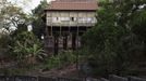 Former British colonial administration building stands on stilts in Hill Station neighbourhood of Sierra Leone's capital Freetown