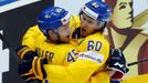 Sweden's Oscar Moller (L) celebrates his goal against the Czech Republic with team mate Mikael Backlund during the first period of their men's ice hockey World Championsh