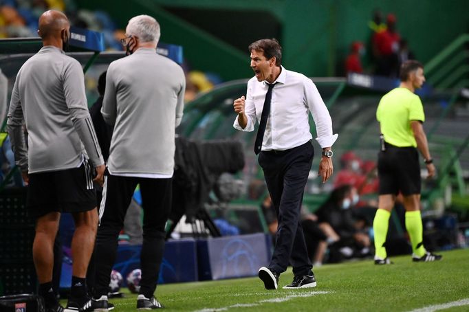 Manchester City - Olympique Lyon. Trenér Lyonu Rudi Garcia slaví vítězství ve čtvrtfinále.