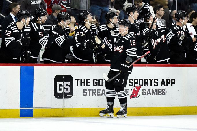 Apr 11, 2025; Newark, New Jersey, USA; New Jersey Devils left wing Ondrej Palat (18) celebrates with teammates after scoring a goal against the Pittsburgh Penguins during