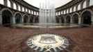 An emblem decorates the pavement next to a fountain inside a building that looks like a Roman Coliseum at the Florentia Village in the district of Wuqing, located on the outskirts of the city of Tianjin June 13, 2012. The shopping center, which covers an area of some 200,000 square meters, was constructed on a former corn field at an estimated cost of US$220 million and copies old Italian-style architecture with Florentine arcades, a grand canal, bridges, and a Coliseum-like building. REUTERS/David Gray (CHINA - Tags: SOCIETY BUSINESS) Published: Čer. 13, 2012, 5:17 odp.