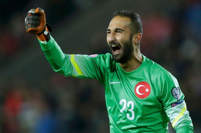 Turkey's goalkeeper Volkan Babacan celebrates after a goal was scored against Czech Republic during their Euro 2016 group A qualification soccer match in Prague, Czech Re