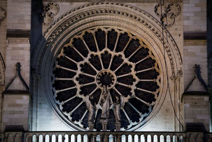 The south rose window of the Notre-Dame de Paris Cathedral, which was ravaged by a fire in 2019, is pictured as restoration works continue in Paris, France, March 14, 202