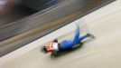 Japan's Hiroatsu Takahashi competes during the men's skeleton test event at the "Sanki" siding center in Rosa Khutor, a venue for the Sochi 2014 Winter Olympics near Sochi February 15, 2013. Although many complexes and venues in the Black Sea resort of Sochi mostly resemble building sites that are still under construction, there is nothing to suggest any concern over readiness. Construction will be completed by August 2013 according to organizers. The Sochi 2014 Winter Olympics opens on February 7, 2014. REUTERS/Kai Pfaffenbach (RUSSIA - Tags: BUSINESS CONSTRUCTION SPORT OLYMPICS) Published: Úno. 15, 2013, 3:19 odp.