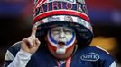 A New England Patriots fan celebrates while awaiting the start of the NFL Super Bowl XLIX football game against the Seattle Seahawks in Glendale, Arizona February 1, 2015