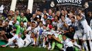 Real Madrid's players and officials celebrate with the trophy after defeating Atletico Madrid in the their Champions League final soccer match at the Luz Stadium in Lisbo