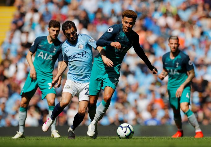 Soccer Football - Premier League - Manchester City v Tottenham Hotspur - Etihad Stadium, Manchester, Britain - April 20, 2019  Tottenham's Dele Alli in action with Manche