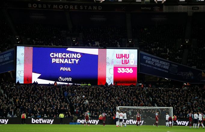 Soccer Football - Premier League - West Ham United v Liverpool - London Stadium, London, Britain - January 29, 2020   The big screen displays a VAR review message before