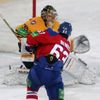 Hokejista Lva Praha Ondřej Němec střílí na Antona Chudobina v utkání KHL 2012/13 proti Atlantu Mytišči.,