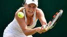 Caroline Wozniacká of Denmark hits a shot during her match against Denisa Allertova of the Czech Republic at the Wimbledon Tennis Championships in London